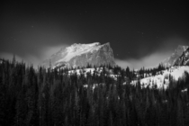 Hallett Peak in Rocky Mountain National Park under the full moon on Friday night I first went to Dream Lake but the winds were too strong to photograph so headed down to Bear Lake where they were still strong I setup behind a boulder with just the camera 
