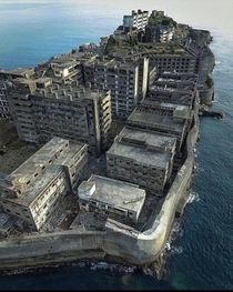 Hashima Island An abandoned offshore mining facility with a peak population of  in 