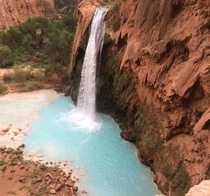 Havasupai Falls Red rock canyon has amazing contrast with the blue pool