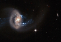 Hubble telescope captures galaxy merger of NGC  January   