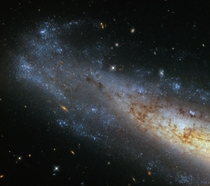 Hubbles Glittering Frisbee Galaxy 