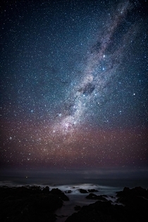 I took a photo of the Milky Way in New Zealand looking out towards the South Island The colours turned out pretty interesting in post processing I reckon