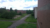 I was in an abandoned industrial park in Pennsylvania usa  Limerick pa the buildings seen were once used to once make either wine glass bottles antifreeze bottles bottle caps for wine Various other types of creation went on here until the s now its just e