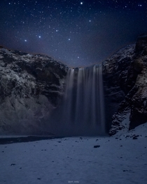 Icelands very popular Skogafoss waterfall in the middle of the night 