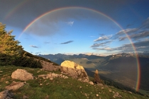 Impressive rainbow over the Dolemites of Italy 