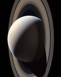 In the cold dark reaches of our Solar System a billion miles from the sun lies Saturn