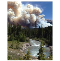 In the summer of  a massive wildfire took over Banff National Park I live in the park and was evacuated during the fire I took this photo five minutes from home 