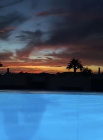 Infinity pool sunset in Ibiza 