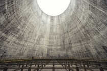 Inside an abandoned cooling tower  by Flash Berger