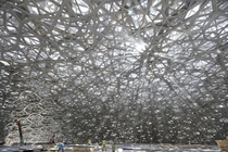 Inside the dome of Jean Nouvels new Louvre Museum in Abu Dhabi 