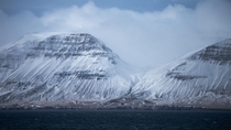 Intense far-off mountains in the remote northern fjords of Iceland 