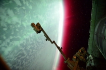 International Space Station captured the planet Earths green auroral display amp rarer reddish band that began during a geomagnetic storm About  km above Earththe orbiting ISS was itself within the realm of the auroral display CreditScott Kelly Expedition