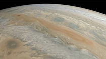 Junos view of Jupiters multi colored turbulent swirlsc