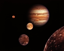 Jupiter amp its four planet-size moons called the Galilean satellites were photographed by Voyager  Reddish Io upper left is nearest Jupiter Europa center Ganymede amp Callisto lower right These are photographed in early March of 