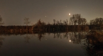 Jupiter Saturn and the Moon reflected in Long Lake - Akron Ohio April  
