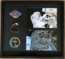 Just got this back from the framers A display with Expedition  and  patches flown to the ISS and a wire tie used on the EVA pictured to the right I got the items directly from astronaut Rick Mastracchio