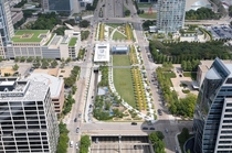 Klyde Warren Park- a deck park covering up  acres of the Woodall Rogers Freeway in Downtown Dallas