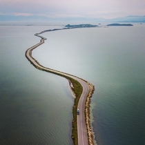 km of rural roadway through the Ambracian wetland connect Koronisia islet to mainland Greece
