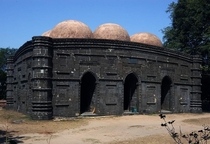Kusumba mosque at Naogaon Kusumba Mosque termed as the Black Gem of Bengal is situated at the village Kusumba in Naogaon According to an inscription it was erected by a patron Sulayman in - during the reign of Ghiyath al-Din Bahadur Shah Hasan 