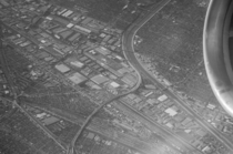 LA highway train tracks and canal as seen during takeoff from LAX 