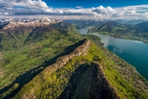 Lake Annecy a perialpine lake in Haute-Savoie in France It is known as Europes cleanest lake because of strict environmental regulations introduced in the s  photo by Tristan Shu