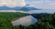 Lake Ngade Ternate in the front of Maitara Island and mount Kie Matubu the highest stratovolcano in North Maluku Indonesia 