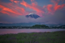 Land of the Rising Sun clouds over Mount Fuji filled with the colors of dawns sunlight  by MIYAMOTO Y x-post rJapanPics