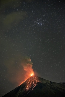 Las Pleiades and the Fuego volcano in Guatemala