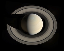 Last week Cassini changed its orbital inclination and captured  images of Saturn from an unusual angle high over the planets north pole Someone assembled them into one picture and this was the result 