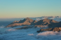 Late afternoon above the sea of clouds looking east over the central Pyrenees Pic du Midi de Bigorre France 