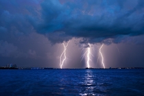 Lightning strikes over the Caloosahatchee River in Downtown Ft Myers Florida