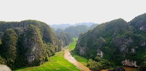 Limestone Mountains towering over rice fields in Ninh Binh 