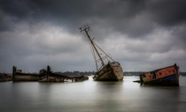 Long-forgotten Ships in the River Orwell at Pin Mill Suffolk UK  by Richard Sherman
