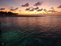 Meeru Island Maldives sunset from an overwater villa beautiful mix of colour in the sea 