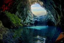 Melissani Cave located on the island of Kefalonia Greece featuring a sky blue lake 