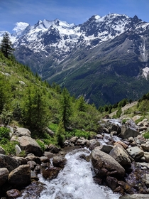 Meltwater rushing down in early summer in Valais Switzerland 