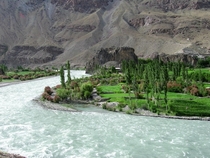 Mid-Day Sight of Chitral Valley Pakistan  by Afzal