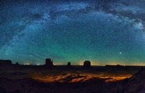 Milky Way arching over Monument Valley 