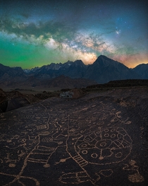 Milky Way rising above petroglyphs in California