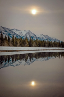 Mirrored reflection near Johnson Lake in Alberta Canada 
