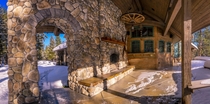 Montana Lodge with an outdoor fireplace 