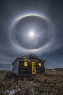 Moon Halo Over Abandoned House
