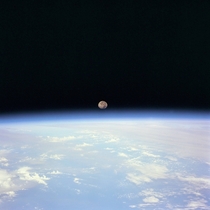 Moon Set over Earth taken from Space Shuttle Discovery during STS- 