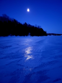 Moonlight on ice Little Traverse Bay Lake Michigan Petoskey MI USA OC