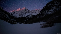Moonrise Alpenglow and a sky full of stars at the Maroon Bells in Colorado 