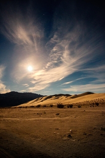 Moonrise over the Eureka Dunes Dry Camp in Death Valley CA 