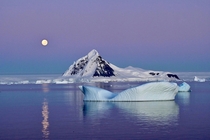 MoonsetSunrise below the Polar Circle in Antarctica 
