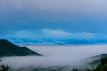 Morning fog submersing the Blue Ridge Mountains of North Carolina USA 