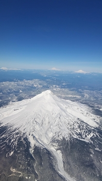 Mount Hood from the sky with St Helens Rainier and Adams in the background 