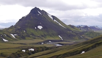 Mt Strasla Iceland covered in green moss and black volcanic ash 